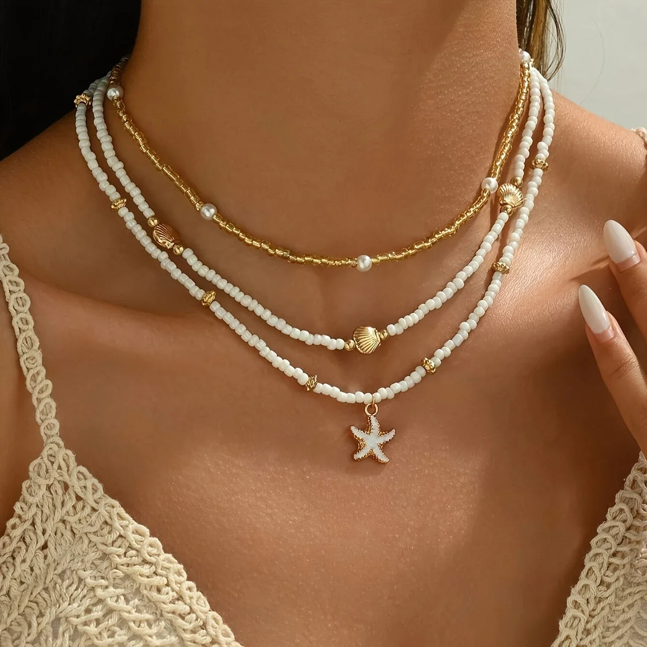 Gargantilla bohemia hecha a mano con cuentas apiladas, delicado collar con colgante de concha de estrella de mar, joyería para mujer para fiestas de playa y vacaciones de verano