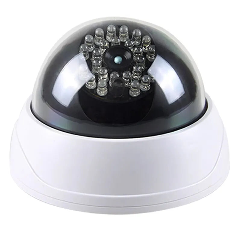 Cámara de seguridad domo falsa con luz LED roja, funciona con pilas y no requiere cableado. Ideal para interiores y exteriores.