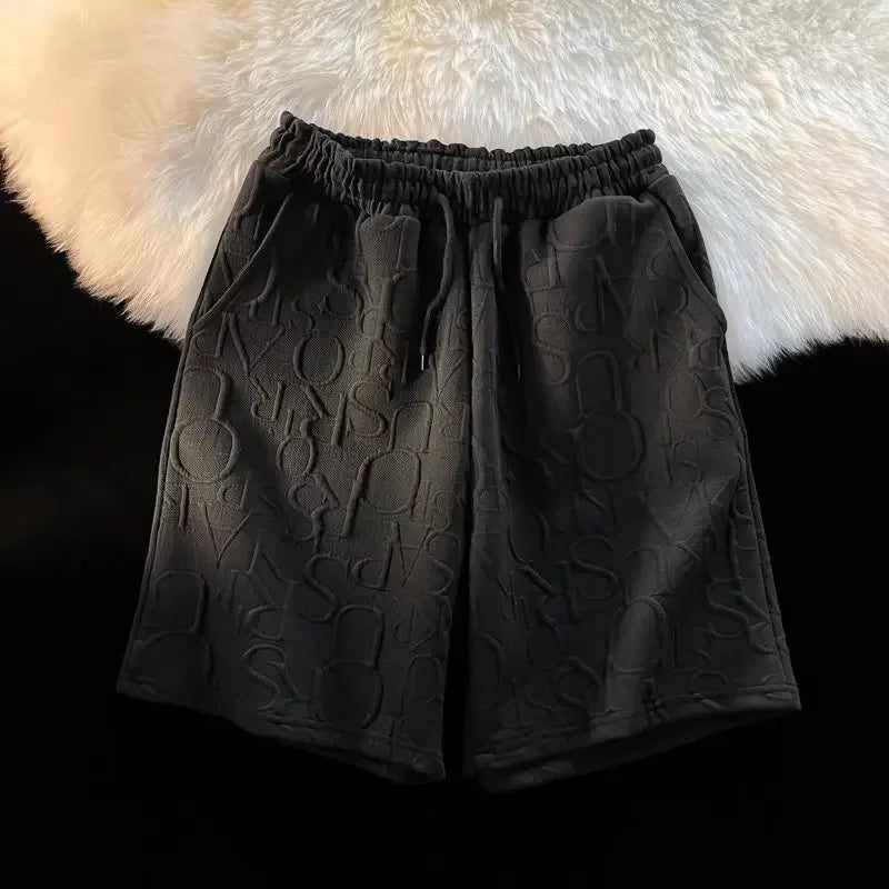 Pantalones cortos holgados de cinco puntos para hombre, estilo americano, estilo retro, de baloncesto, informales, de verano, con diseño de nicho y sensación de ocio.