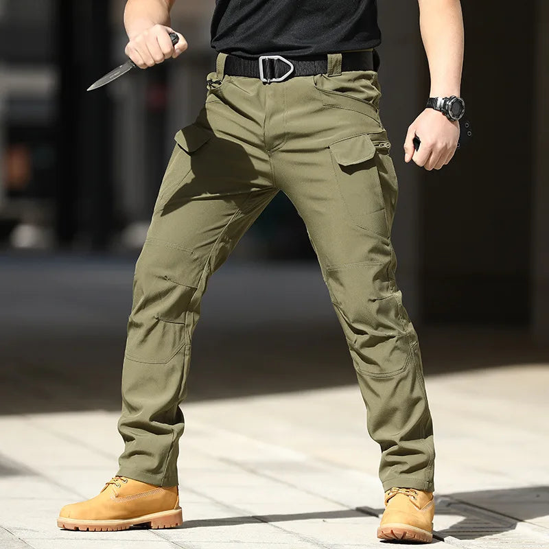 Pantalones tácticos militares urbanos para hombre, estilo cargo, con múltiples bolsillos, impermeables, resistentes al desgaste, ideales para entrenamiento informal.