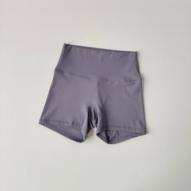 Pantalones cortos deportivos de yoga, ajustados, elásticos, de tres piezas, con cintura alta, realce de cadera y secado rápido.
