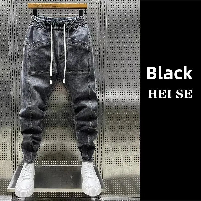 Pantalones vaqueros holgados de talla grande para hombre, informales, de moda, para otoño e invierno, con puños, estilo coreano, versátiles, duraderos, cómodos y ajustados.