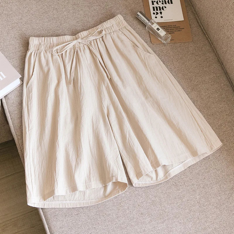 Pantalones cortos de algodón para mujer, informales, de verano, con dos bolsillos, de cintura alta, holgados, suaves y frescos.