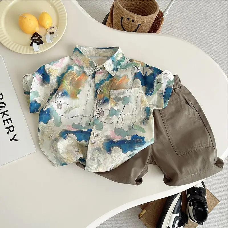 Ropa para niños 2025, nuevo traje de flores de moda para bebé, camisa de manga corta, pantalones cortos, elegante conjunto de dos piezas de pantalones cortos casuales retro.