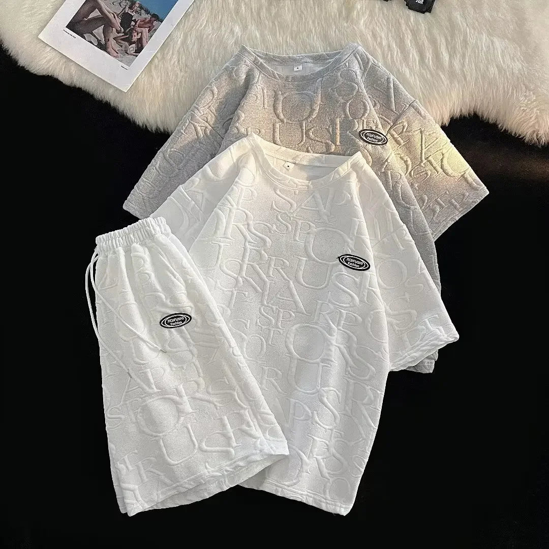 Conjunto de camiseta y pantalones cortos de manga corta para hombre, ropa deportiva informal de verano, corte holgado, marca de moda, largo de cinco cuartos, cómodo