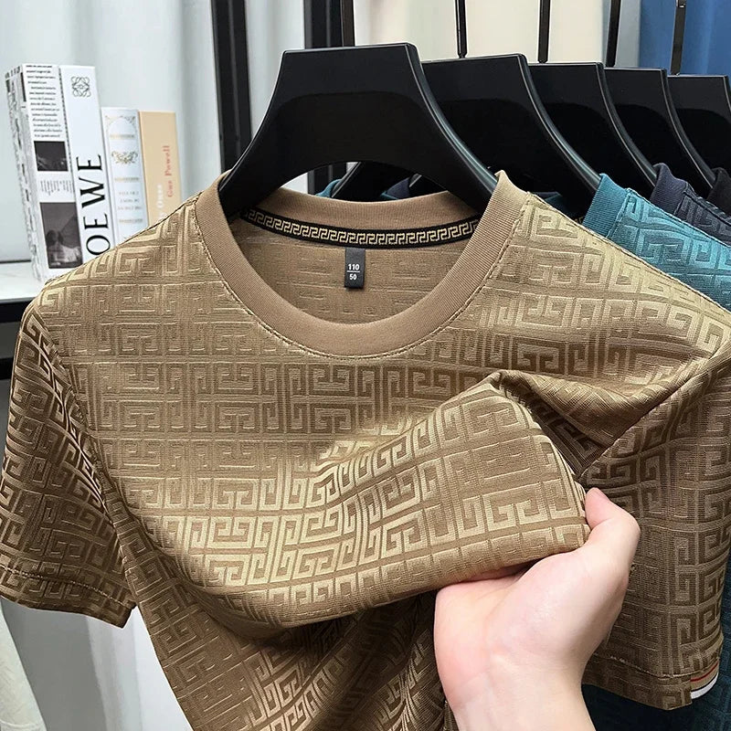 Camiseta de cuello redondo y manga corta de jacquard de moda para hombre, nueva, informal, cómoda y versátil para todas las estaciones, 2025