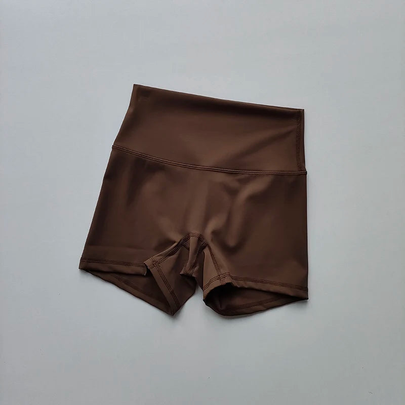Pantalones cortos deportivos de yoga, ajustados, elásticos, de tres piezas, con cintura alta, realce de cadera y secado rápido.
