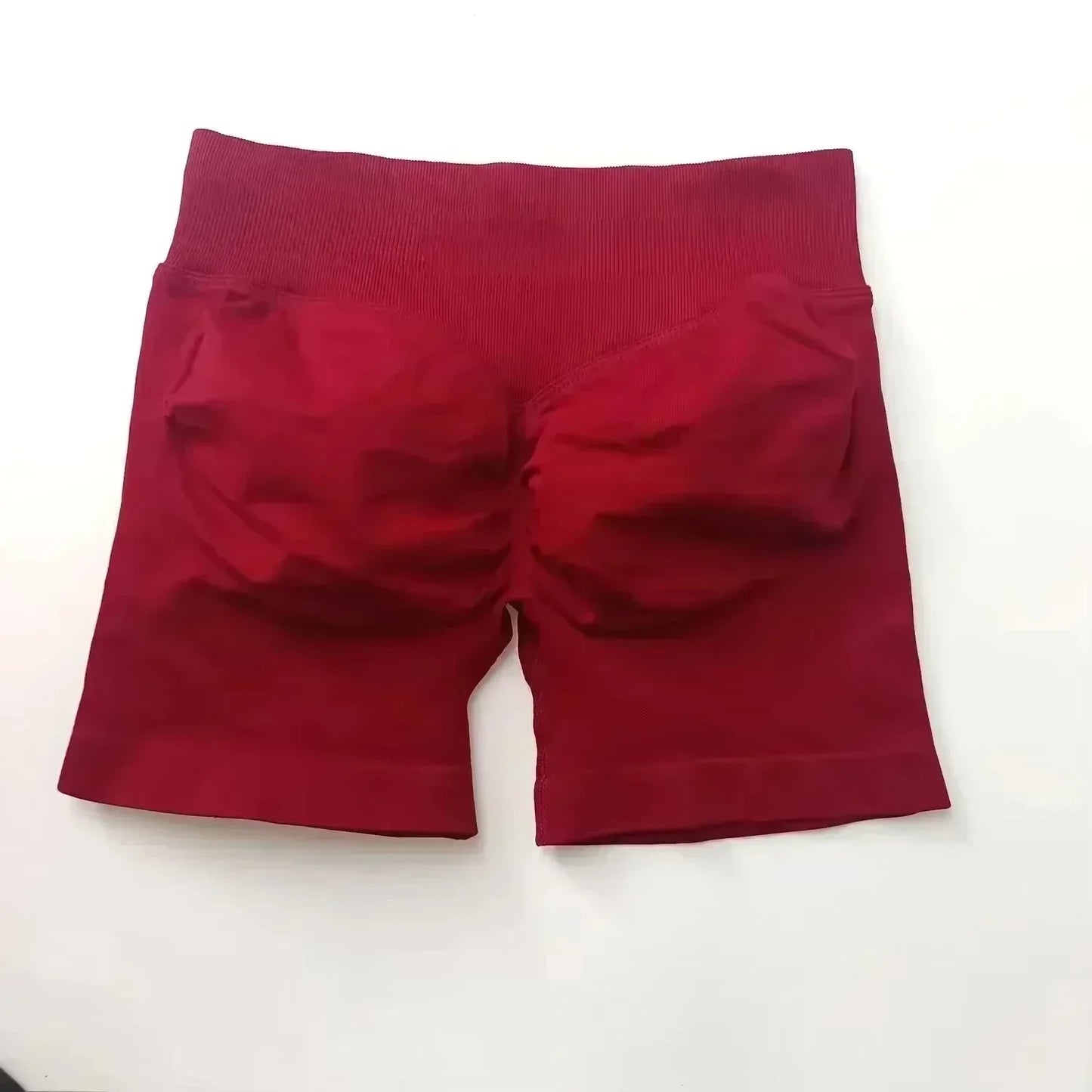Pantalones cortos deportivos de yoga para mujer, de verano, con efecto piel de melocotón, con bolsillo en la cadera, cintura alta, levantamiento de cadera, secado rápido.