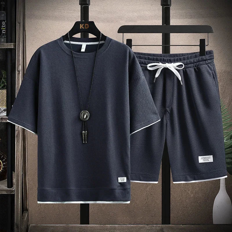 Conjunto deportivo informal de verano para hombre, pantalones cortos de manga corta con cordón, pantalones holgados de cinco cuartos, traje fino de dos piezas para hombre