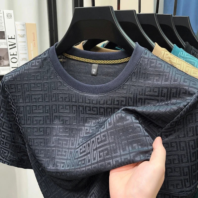 Camiseta de cuello redondo y manga corta de jacquard de moda para hombre, nueva, informal, cómoda y versátil para todas las estaciones, 2025