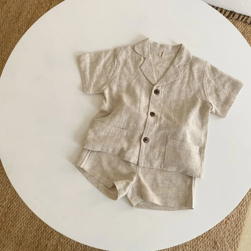 Conjuntos de ropa para bebé niño y niña, camisa y pantalón corto de lino de verano para bebé pequeño, mono con botones de manga corta, ropa para bebé de 1 a 7 años
