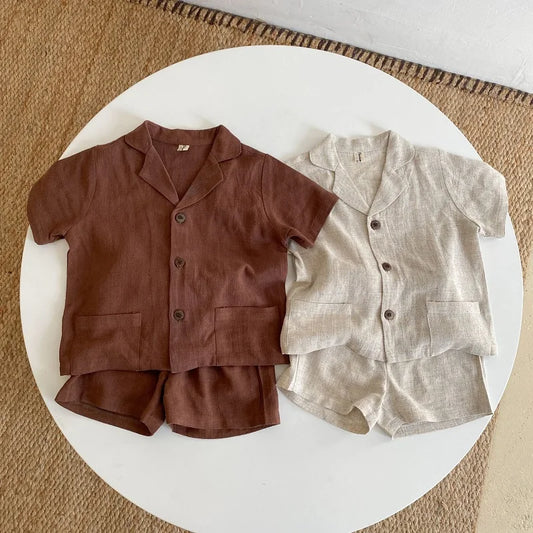 Conjuntos de ropa para bebé niño y niña, camisa y pantalón corto de lino de verano para bebé pequeño, mono con botones de manga corta, ropa para bebé de 1 a 7 años