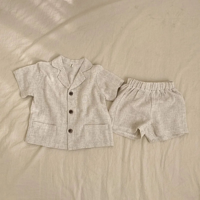 Conjuntos de ropa para bebé niño y niña, camisa y pantalón corto de lino de verano para bebé pequeño, mono con botones de manga corta, ropa para bebé de 1 a 7 años