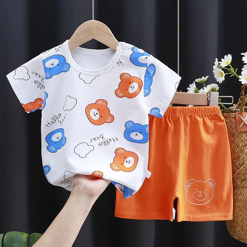 Conjunto de ropa para niños, camiseta y pantalones cortos para bebé niño/niña, ropa de verano de algodón con dibujos animados, chándal informal para niño y bebé.