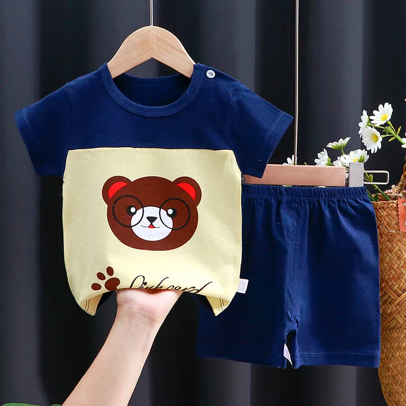 Conjunto de ropa para niños, camiseta y pantalones cortos para bebé niño/niña, ropa de verano de algodón con dibujos animados, chándal informal para niño y bebé.
