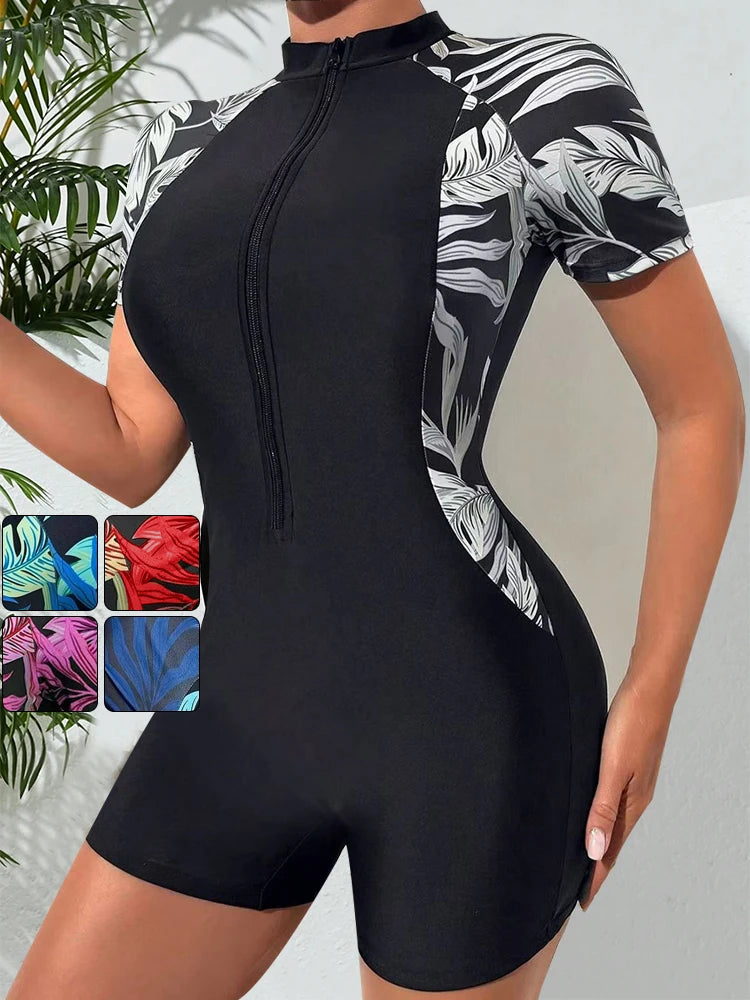 Traje de baño enterizo floral para mujer, manga corta, cierre frontal, estampado tropical, ideal para surfear, con protección solar (sin sujetador incorporado).