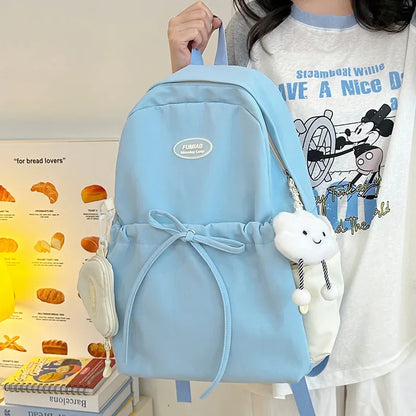 Bonita mochila escolar de nailon con doble hombro para niña, capacidad de 20 a 35 litros, forro de polietileno, correa curva, diseño de color liso.