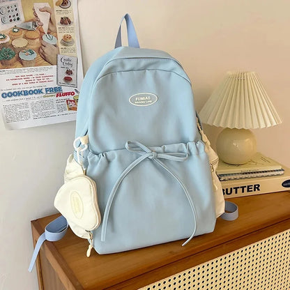Bonita mochila escolar de nailon con doble hombro para niña, capacidad de 20 a 35 litros, forro de polietileno, correa curva, diseño de color liso.