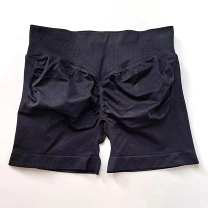 Pantalones cortos deportivos de yoga para mujer, de verano, con efecto piel de melocotón, con bolsillo en la cadera, cintura alta, levantamiento de cadera, secado rápido.
