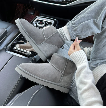 Botas de nieve integradas de piel de oveja y lana para hombres y mujeres, cuero auténtico y piel, botas de invierno gruesas y cálidas para mujer.