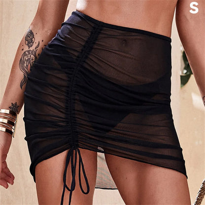 Traje de baño sexy translúcido, falda de playa, falda de gasa para vacaciones en la playa, falda con volantes, falda de malla con cordón ajustable, ropa de playa sólida, falda a la cadera