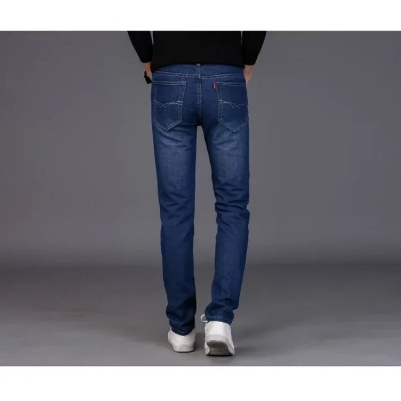 Pantalones vaqueros casuales para hombre, primavera otoño, corte entallado, estilo coreano, de marca moderna, que suavizan tu silueta.