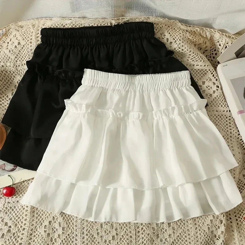 Falda blanca con volantes Kawaii de verano para mujer, minifaldas de gasa ajustadas a la moda Y2K, elásticas, de cintura alta y color negro