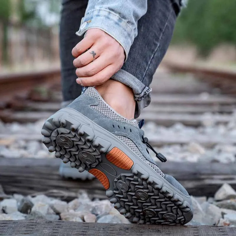 Zapatos de seguridad de piel de vaca, transpirables, para hombre, con puntera de acero, resistentes a impactos, botas de trabajo, indestructibles, zapatillas de trabajo modernas.