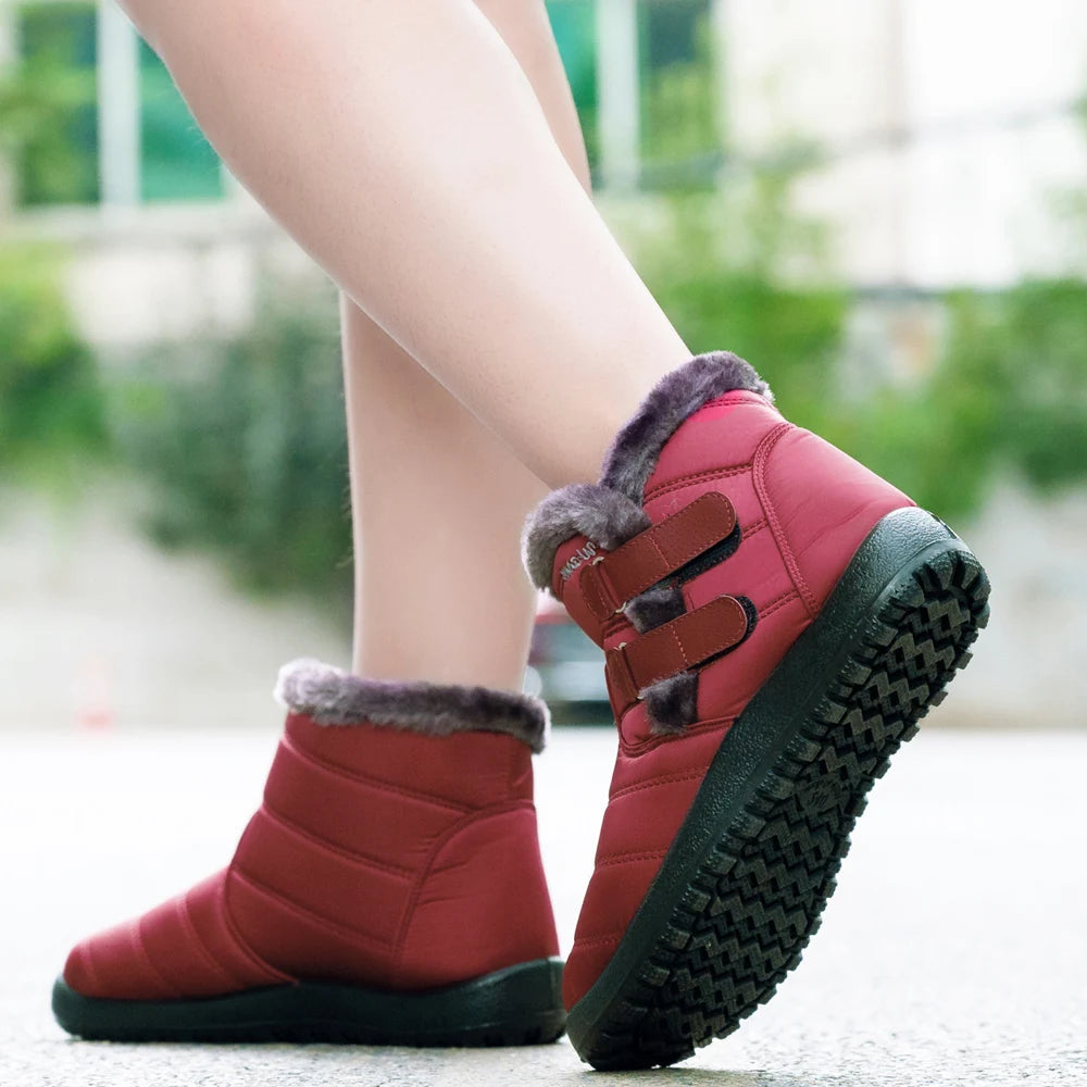 Botas de nieve cálidas de piel para mujer, botines de tobillo de talla grande, informales, planos, de invierno, antideslizantes, a la moda, impermeables