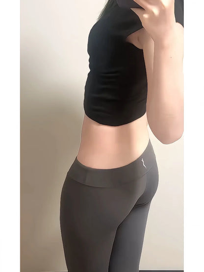 Pantalones largos de yoga de seda de hielo de cintura baja para mujer, ideales para el verano. Diseño que realza el abdomen y los glúteos, perfectos para el ejercicio y el fitness.