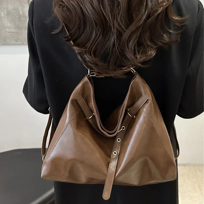 Bolso de mano retro de gran capacidad para mujer, mochila informal de moda con doble hombro para otoño e invierno, nuevo bolso de moda.