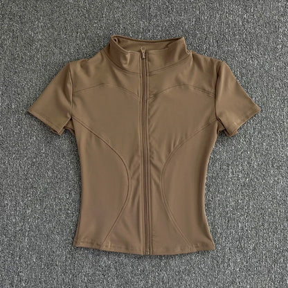 Camisetas de entrenamiento adelgazantes de cintura de verano de alta calidad para mujer, de secado rápido, con cuello alto ajustado y cremallera completa, camisetas de yoga de manga corta.