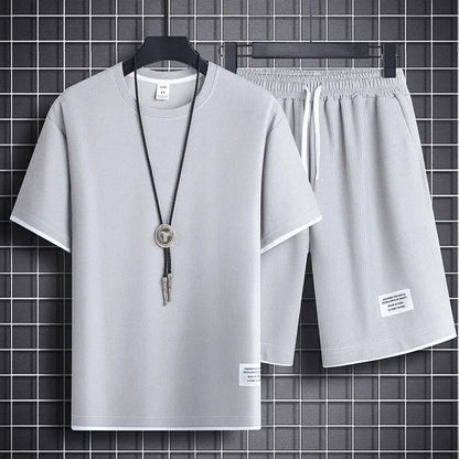 Conjunto deportivo informal de verano para hombre, pantalones cortos de manga corta con cordón, pantalones holgados de cinco cuartos, traje fino de dos piezas para hombre