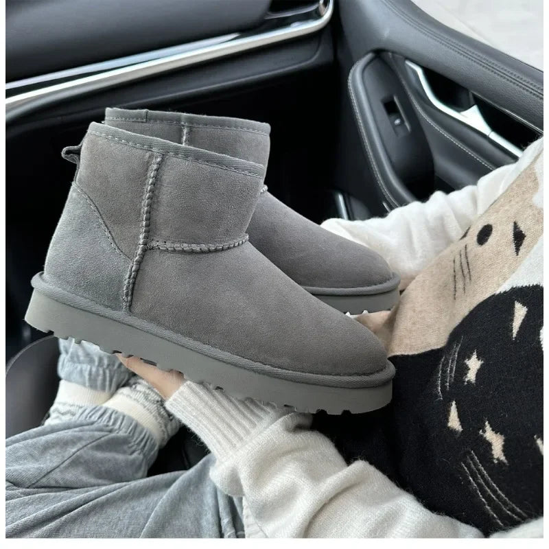 Botas de nieve integradas de piel de oveja y lana para hombres y mujeres, cuero auténtico y piel, botas de invierno gruesas y cálidas para mujer.
