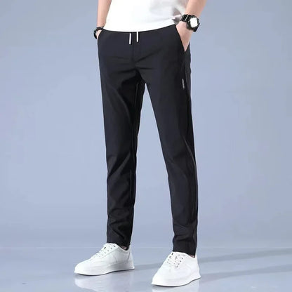 Pantalones deportivos largos de seda de hielo para hombre, de verano, nuevos, finos, informales, de negocios, elásticos, transpirables, de pierna recta, de talla grande