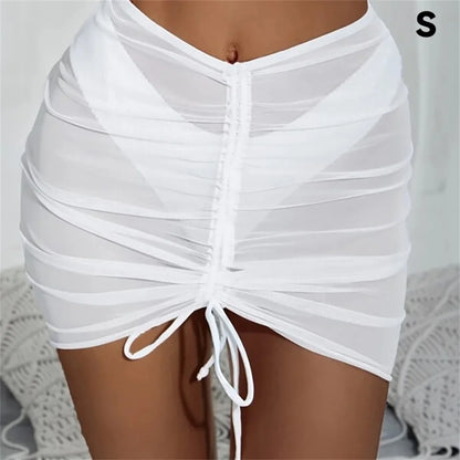 Traje de baño sexy translúcido, falda de playa, falda de gasa para vacaciones en la playa, falda con volantes, falda de malla con cordón ajustable, ropa de playa sólida, falda a la cadera