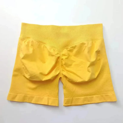 Pantalones cortos deportivos de yoga para mujer, de verano, con efecto piel de melocotón, con bolsillo en la cadera, cintura alta, levantamiento de cadera, secado rápido.