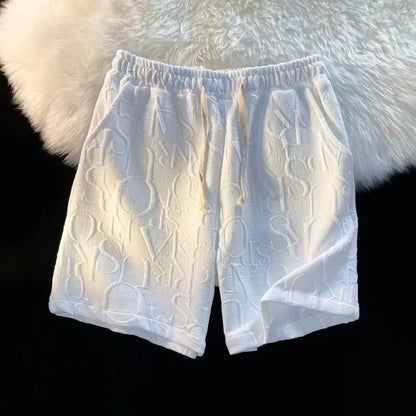 Pantalones cortos holgados de cinco puntos para hombre, estilo americano, estilo retro, de baloncesto, informales, de verano, con diseño de nicho y sensación de ocio.