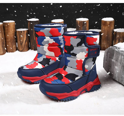 Zapatos de invierno 2025 para niños, de felpa, impermeables, antideslizantes, con suela de goma, botas de nieve cálidas a la moda para exteriores.
