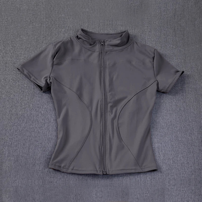 Camisetas de entrenamiento adelgazantes de cintura de verano de alta calidad para mujer, de secado rápido, con cuello alto ajustado y cremallera completa, camisetas de yoga de manga corta.