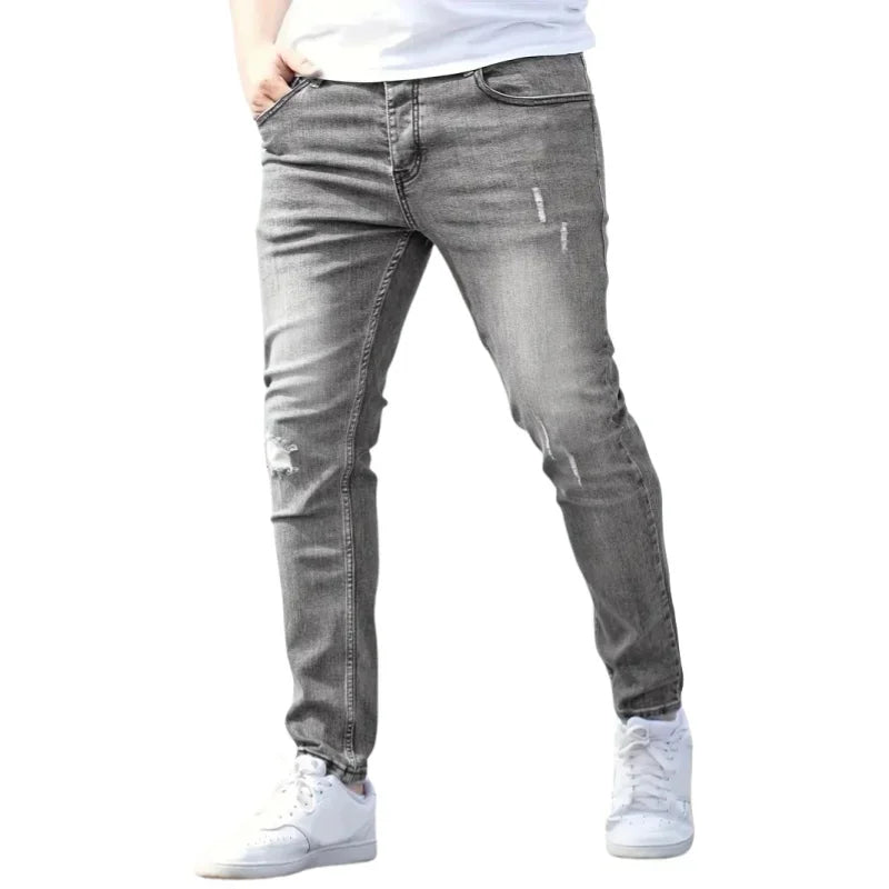 Pantalones vaqueros elásticos de corte ajustado para hombre, estilo urbano clásico informal, con cremallera, de mezclilla, de diseñador, en negro y azul.