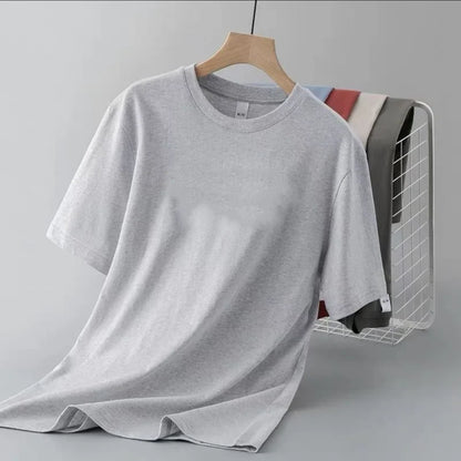 Camiseta de manga corta de color liso para hombre, corte entallado, clásica, versátil, interior, adelgazante, para verano, 2024