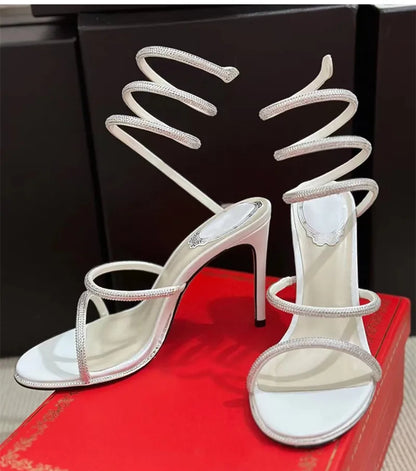 Sandalias de verano de moda para mujer, con diseño de serpiente y cristales, adornadas con lujosos diamantes de imitación y tacones finos estilo gladiador. Ideales para fiestas y eventos.