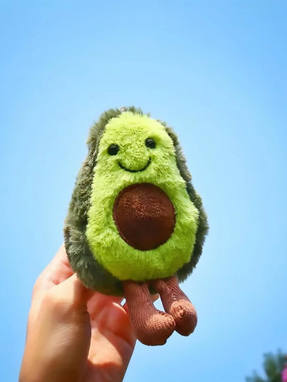 Un lindo juguete de peluche de aguacate para mascotas, adecuado para la compañía diaria de perros pequeños y medianos.