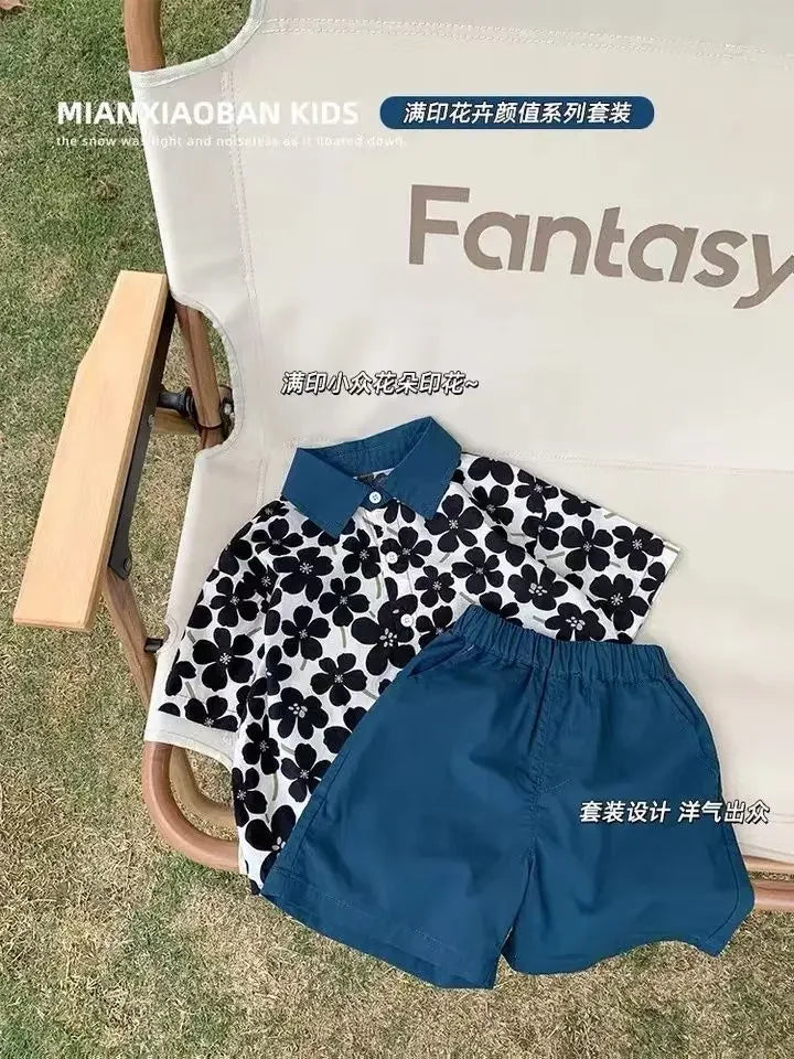 Ropa para niños 2025, nuevo traje de flores de moda para bebé, camisa de manga corta, pantalones cortos, elegante conjunto de dos piezas de pantalones cortos casuales retro.