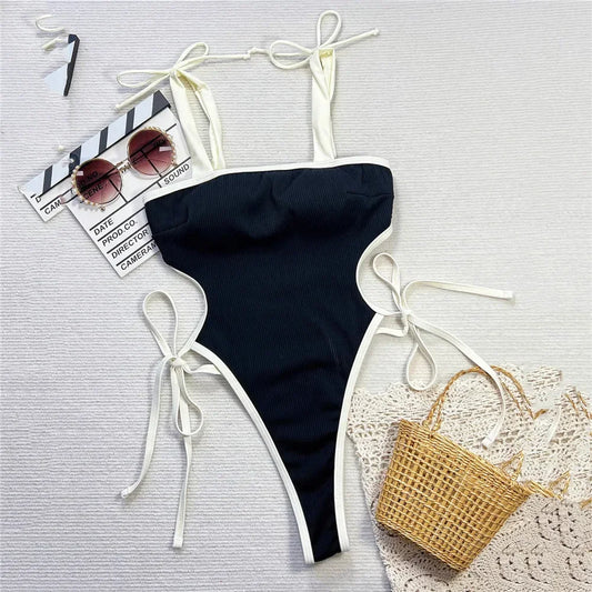 Traje de baño sexy negro sin espalda para mujer 2025, traje de baño de una pieza en contraste blanco y negro, monokini ahuecado con cordones.