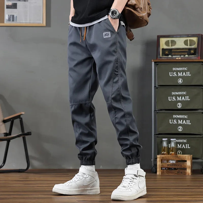Pantalones casuales de hombre de corte holgado y a la moda, ideales para otoño e invierno. Estilo deportivo clásico y sencillo. Cómodos pantalones holgados para el trabajo.