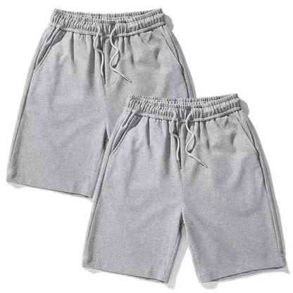 Pantalones cortos deportivos holgados de color puro para hombre y mujer, informales, de verano, con pierna recta, adelgazantes, de cinco cuartos