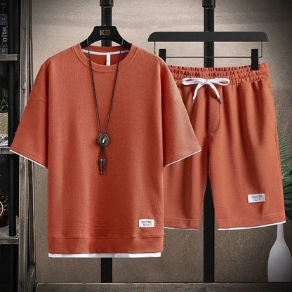 Conjunto deportivo informal de verano para hombre, pantalones cortos de manga corta con cordón, pantalones holgados de cinco cuartos, traje fino de dos piezas para hombre