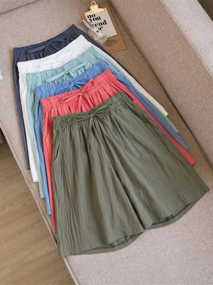 Pantalones cortos de algodón para mujer, informales, de verano, con dos bolsillos, de cintura alta, holgados, suaves y frescos.